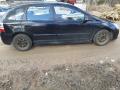 Kuva 2: Honda Civic VII Hatchback 1,6i EU -04 2004