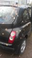 Kuva 2: Nissan Micra 1,2 -06 musta 3-ov HB 2006