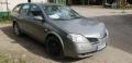 Kuva 2: Nissan Primera 2.2dCi -05 FARMARI harmaa 2005