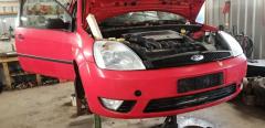Ford Fiesta 1,4 -04 3-ov HB punainen
