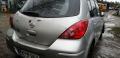 Kuva2: Nissan Tiida 1,5 DCI--09 5-ov HB harmaa