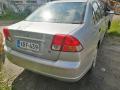 Kuva 2: Honda Civic 1,4 -03 sedan harmaa 2003