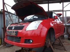Suzuki Swift 1,3 -06 5-ov HB kirkkaanpunainen