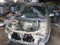 Kuva 2: Nissan Primera 1.6 2005