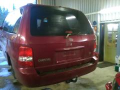 Kia Carnival 2,9 crdi -04 punainen