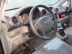 Kia Carens 2,0 -07 t.harmaa