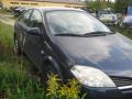 Kuva 3: Nissan Primera 1.6i 16v 2005