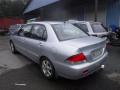 Kuva 3: Mitsubishi Lancer VII 4D Sedan 1.6i MT5 Invite 2005