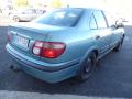 Kuva 3: Nissan Almera (N16) 1.5 2002 90hv sedan 2002