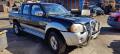 Kuva 3: Nissan King Cab D22 2.5DI  4 ovinen 2003