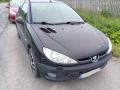 Kuva 3: Peugeot 206 1.4 3ov. HB -06 2006