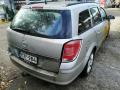 Kuva 3: Opel Astra H 1.8  -06 farmari hopea 2006