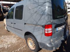 Volkswagen Caddy 1,6 di -12 harmaa palovaurio
