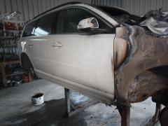 Volvo V70 1,6 -10 valkoinen palovaurio