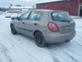 Kuva 4: Nissan Almera 1.5 HB 5-ov. -05 2005