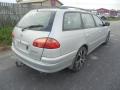 Kuva 4: Toyota Avensis 1.8 VVti A Farm. -02 2002