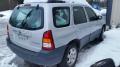 Kuva 4: Mazda Tribute 2.0i 4wd 2003