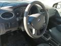 Kuva 4: Ford Focus 1,6 HB harmaa -06 2011