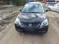 Kuva 4: Honda Civic VII Hatchback 1,6i EU -04 2004