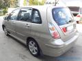 Kuva 4: Suzuki Liana 1,6 HB 4x4 -06 2006