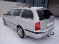 Kuva 4: Skoda Octavia 1U5 5D Combi 1.8T MT5 Ambiente 2004