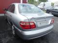 Kuva 4: Nissan Almera (N16) 1.8 2003 116hv sedan 2003