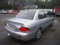 Kuva 4: Mitsubishi Lancer VII 4D Sedan 1.6i MT5 Invite 2005