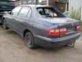 Kuva 4: Toyota Carina E 1.6i 16v sedan 1994