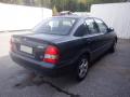 Kuva 4: Mazda 323 BJ Pre-Facelift 4D Sedan 1.5i MT5 1999