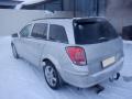 Kuva 4: Opel Astra H Pre-Facelift 5D STW 1.6i Twinport MT5 Enjoy 2005