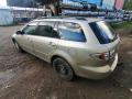 Kuva 4: Mazda 6 2.0 -03 aut. beige farmari 2003