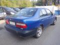 Kuva 4: Nissan Almera N15 Facelift 4D Sedan 1.4i MT5 LX 1999