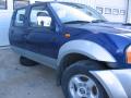 Kuva 4: Nissan King Cab 2,5 TD 4WD 2004