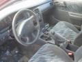 Kuva 4: Toyota Carina E 1,8 GLI-AT191L-BEMNKW/258 1997