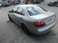 Kuva 5: Nissan Almera  1,5 sedan -02  2002