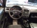 Kuva 5: Toyota Avensis 1.6i Liftback -01 2001