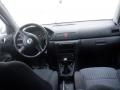 Kuva 5: Skoda Octavia 1U5 5D Combi 1.8T MT5 Ambiente 2004