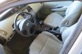 Kuva 5: Nissan Primera 1.8i man. 2004