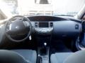 Kuva 5: Nissan Primera WP12 Facelift 5D Wagon 1.6i MT5 Visia 2006