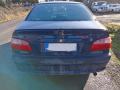 Kuva 5: Toyota Avensis 2.0VVT-i sedan -02 2002