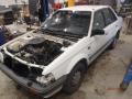 Kuva 6: Mazda 323  1,5 -sedan -88  1988