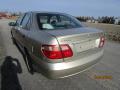 Kuva 6: Nissan Almera 1.5 sedan -04 2004