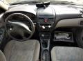 Kuva 6: Nissan Almera (N16) 1,5  -00  2000