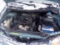 Kuva 6: Nissan Almera Tino V10 5D MPV 1.8i MT5 2003