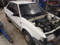 Kuva 7: Mazda 323  1,5 -sedan -88  1988