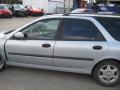 Kuva 7: Renault Laguna 1.9 TDI 77kw farmari 1999