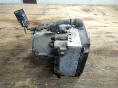 Kuva 1: abs hydraulipumppu, Toyota Carina E 1.6XLI 4D sedan -97