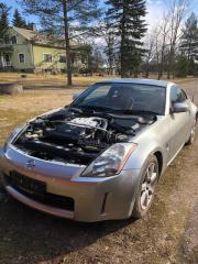 Kuva 1: vasen ovi (2 3 ov.), Nissan 350Z 03->