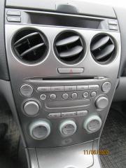 Kuva 1: radio cd ilmastointi kyttpaneeli, Mazda 6 farm. 2.0 -04