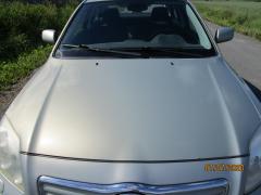 Kuva 1: konepelti, Toyota Avensis sedan 2.0 D-4D -03